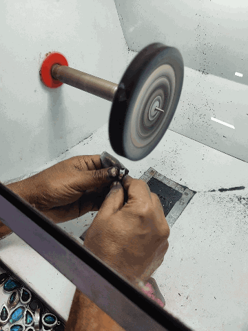 Silver jewellery being hand-polished on the wheel in the Jaipur workshop